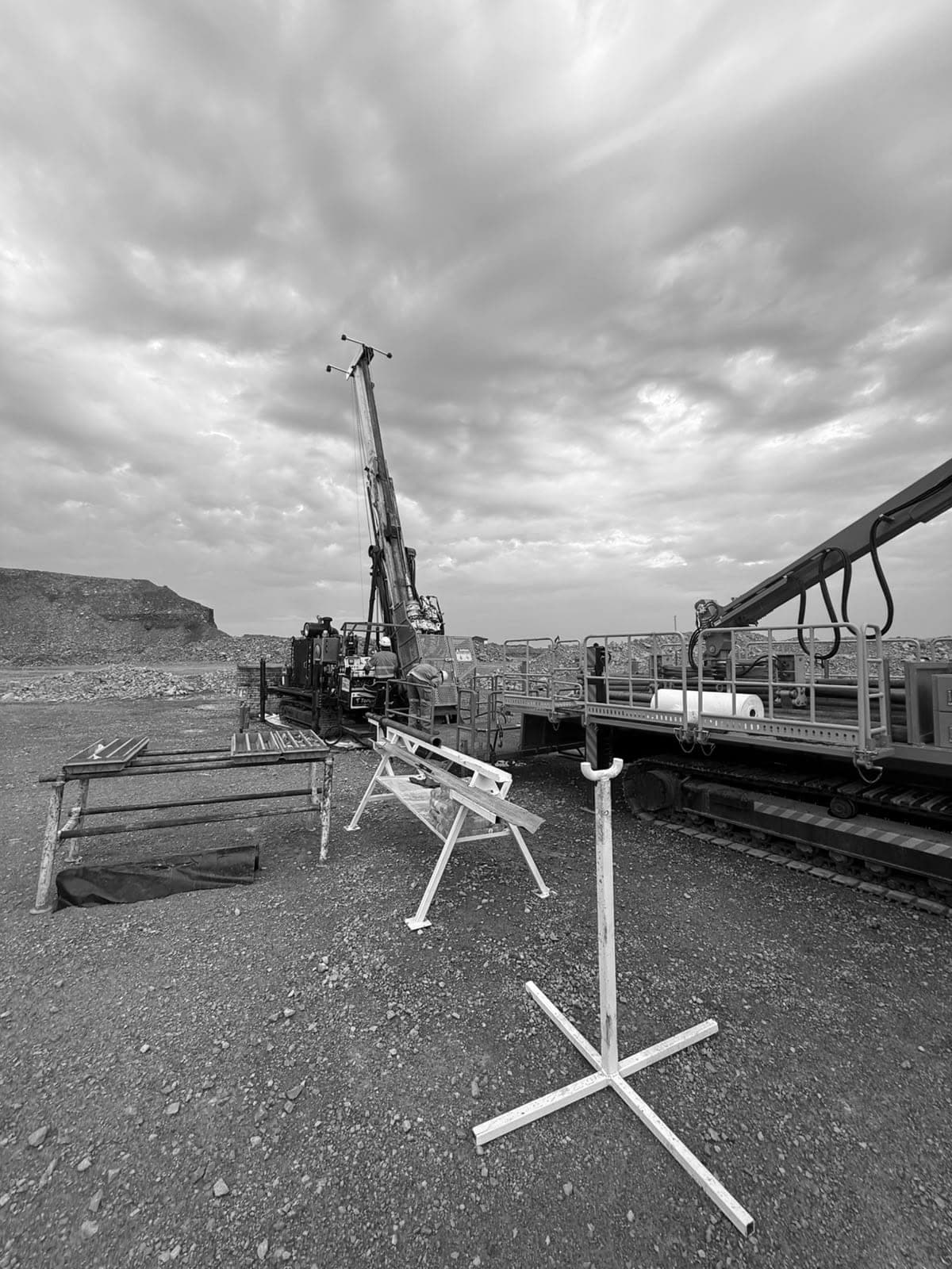 Surface drill rig and rod handler on site